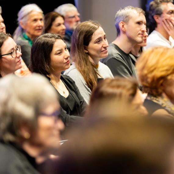 a group of people listening
