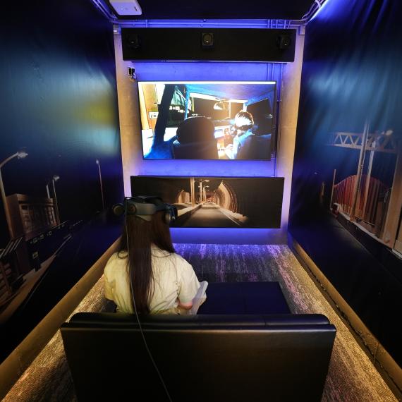 Girl wearing VR headset watching Passenger