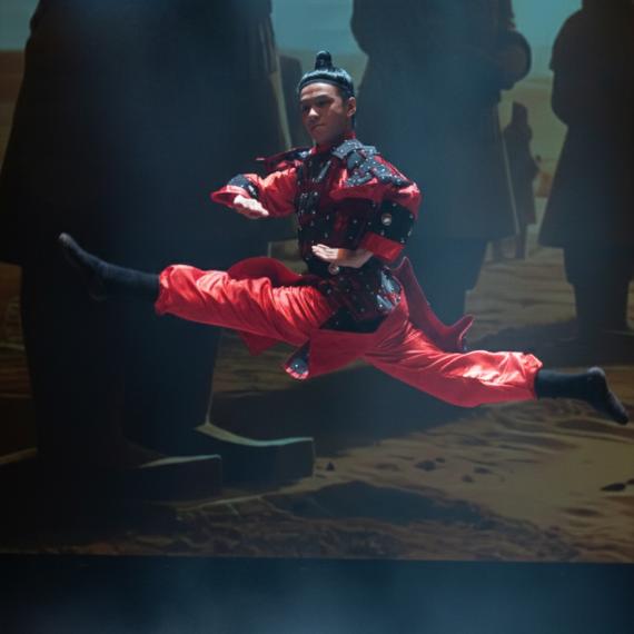 A dancer dressed in Qin dynasty warrior dress
