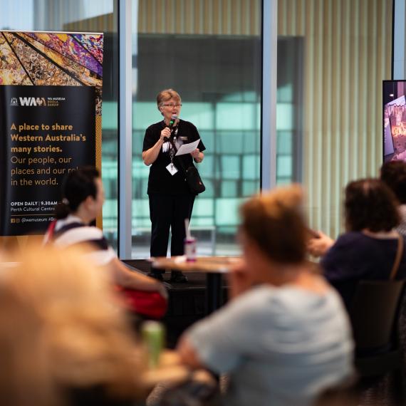 Museum staff presenting to audience of teachrs