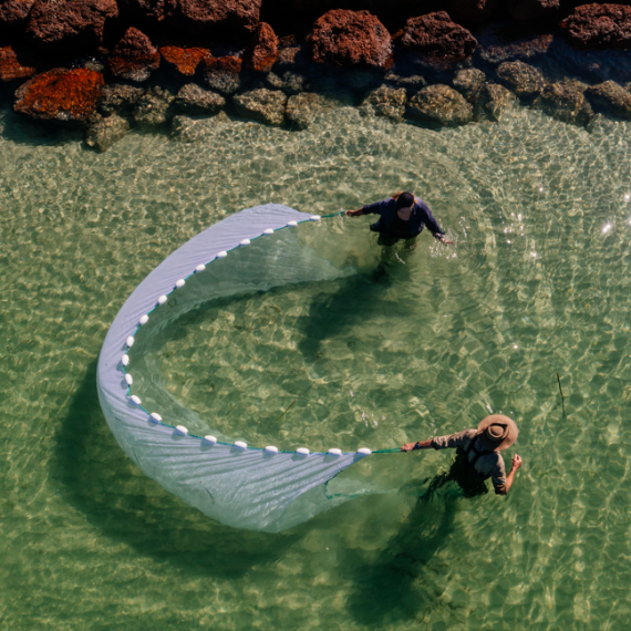 Two people at Emu Point Net Fishing 