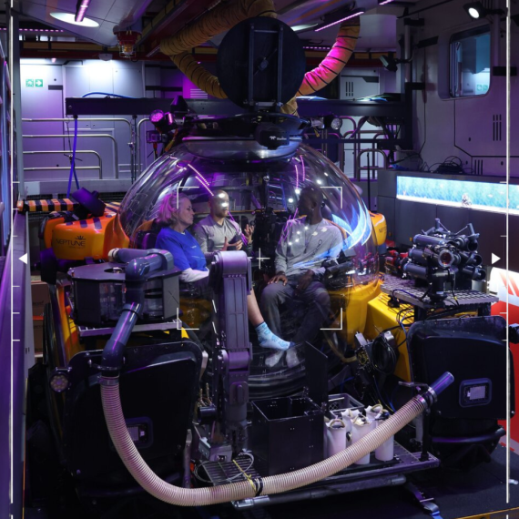 OceanXplorer Research Vessel with people in a submersible. 